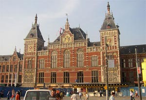 The red-brick front of Amsterdam Centraal Station with its twin towers